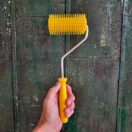 Uncapping Punch Roller